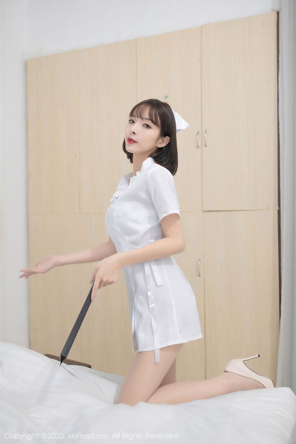 美女模特陈小喵 - 丝袜美腿护士装扮性感写真