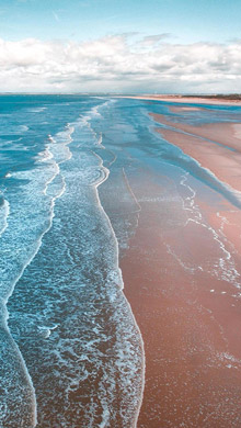 夏天湛蓝色海洋景色手机壁纸 朵朵欢快的浪花们