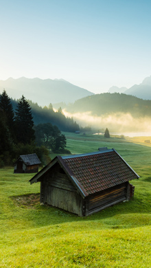 阿尔卑斯山与小木屋风景高清手机壁纸